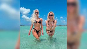 Khloé y Kim Kardashian en mini bikini negro Khloé y Kim Kardashian en mini bikini negro